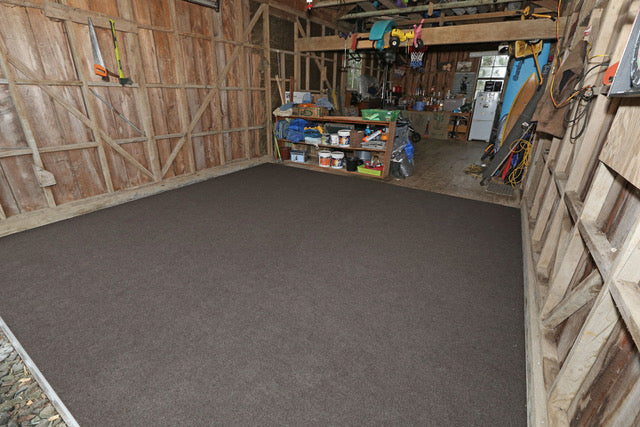 dark brown garage carpet in a old garage