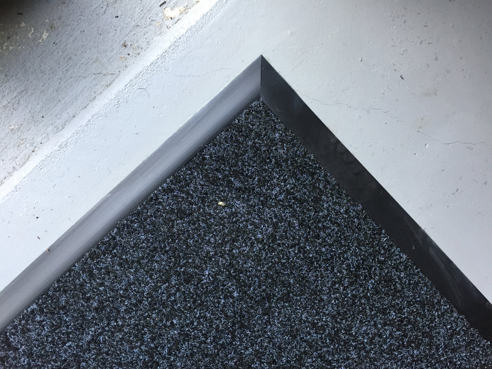 garage carpet corner with rubber edging cut at a right angle