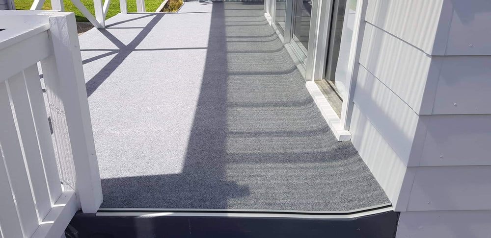 enclosed patio carpeted with garage carpet