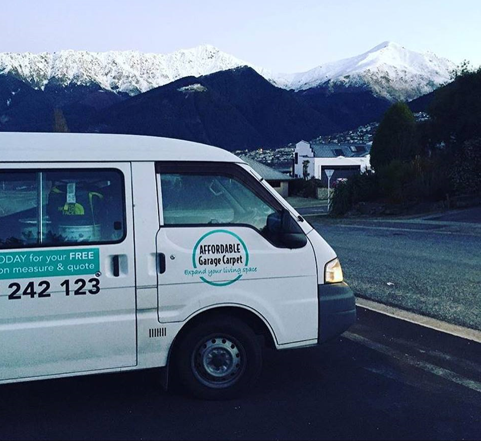 White Affordable Garage Carpet van with snowny mountains in the background