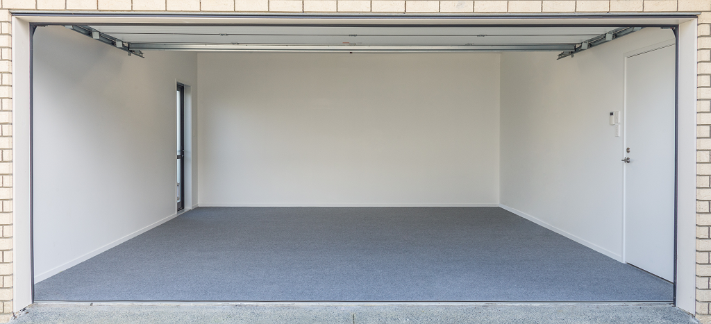 garage carpeted in light grey carpet