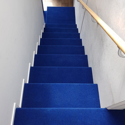 Blue carpet on stairs