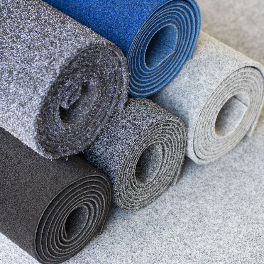 Five different Colours of Garage Carpet Stacked on top of each other