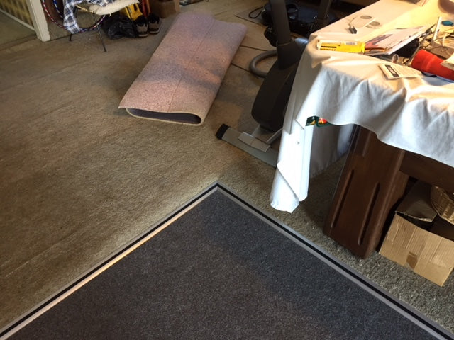 aluminium cut at a right angle to protect garage carpet & household carpet