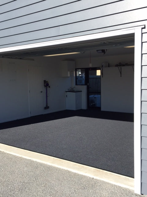 completed installation of charcoal garage carpet