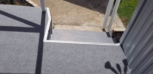 outside deck area carpeted with garage carpet