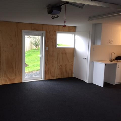 garage carpet with plywood walls