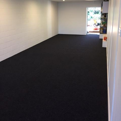 tandem garage with garage carpet 