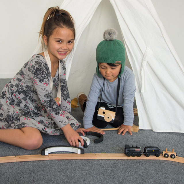 Kids play on garage carpet
